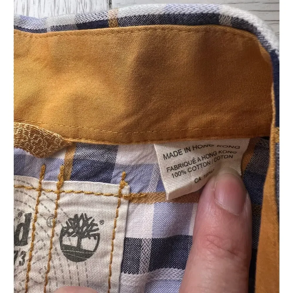 Timberland men’s short sleeve navy & gold plaid button down. 100% cotton. Sz XXL